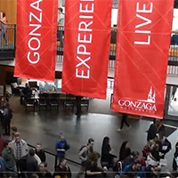 Gonzaga Experience Live banners hang over a lobby with students below.