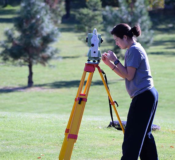 Student surveying campus