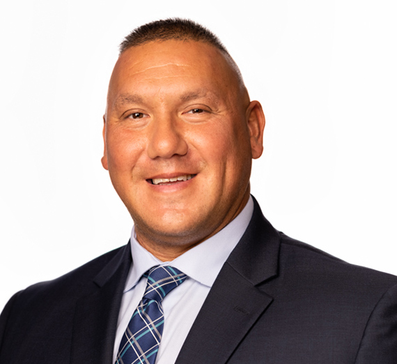 A man in a white baseball cap