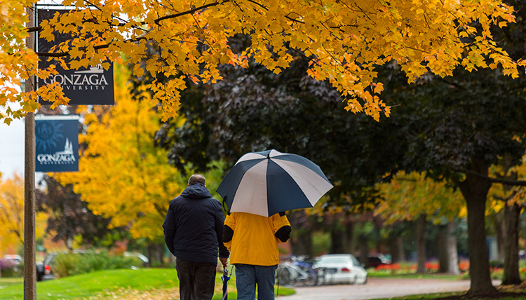 Couple walking on campus