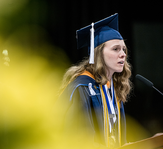 2018 graduate Molly Bosch at podium 