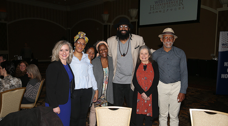 Ronny Turiaf surrounded by family members and two guests from Gonzaga
