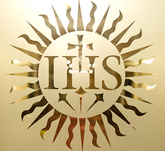 the IHS logo etched in glass 