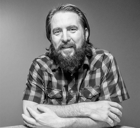 bride and groom embrace outdoors