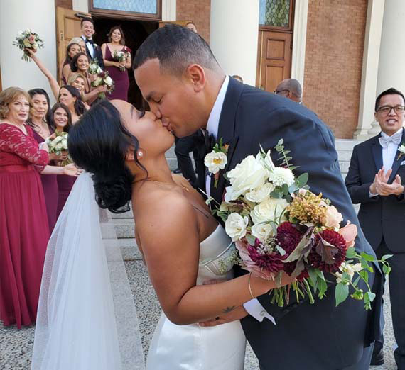 wedding couple shows off rings