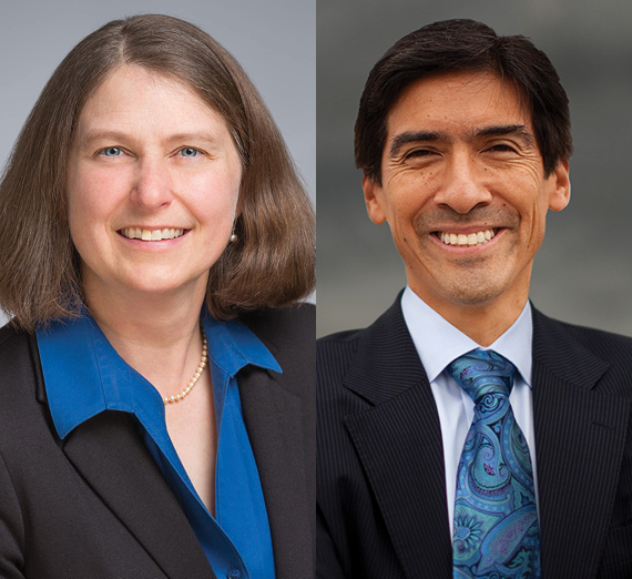 Gonzaga University students with their faces painted cheering in the Kennel Club student section at a basketball game