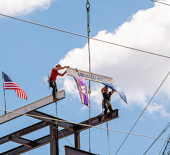 The final structural beam was placed in May, “topping off” the building that will become the new home for the University of Washington School of Medicine-Gonzaga University Health Partnership’s medical and health education, research and innovation center. (GU photo) 