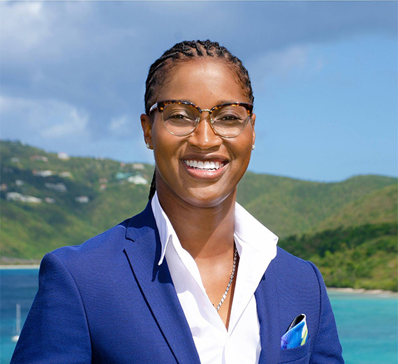 Virgin Islands Sen Janelle Sarauw with backdrop of Island scenery 