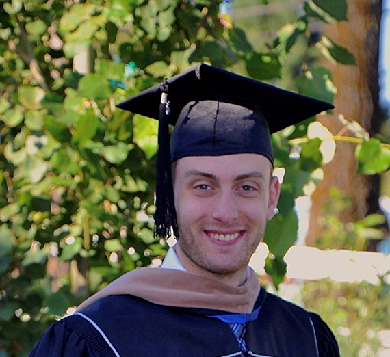 grad student in cap and gown 