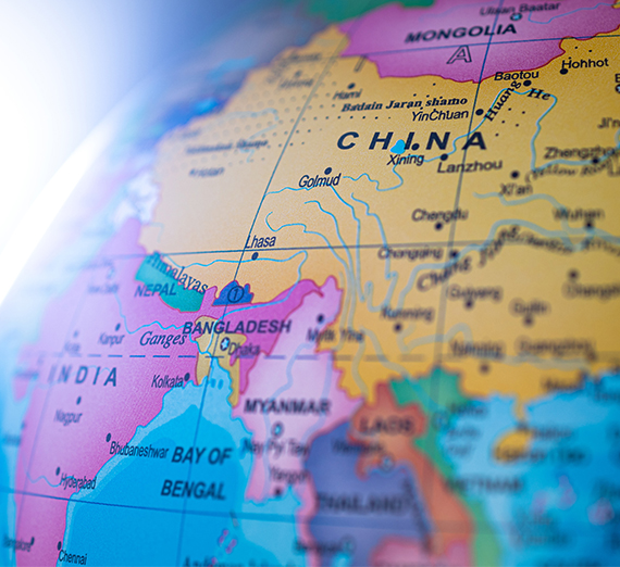 students with flags representing many countries