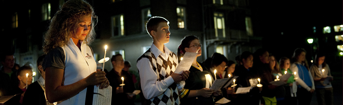 tudents at candlelight vigil