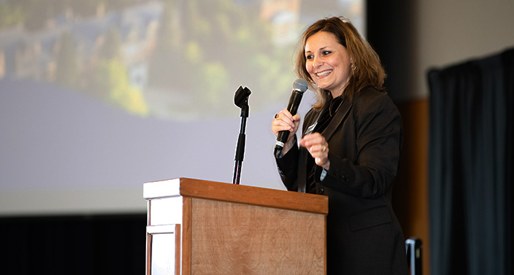 President Passerini addresses a crowd. President Passerini addresses a crowd.