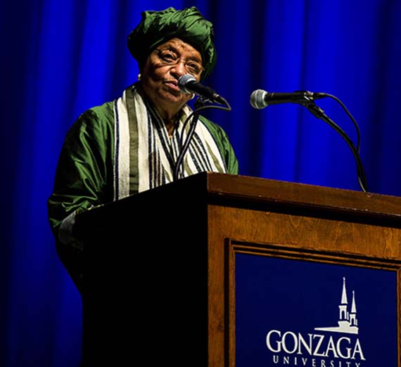 Visiting head of state Ellen Johnson Sirleaf speaks at a podium.