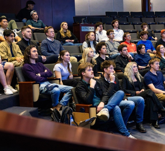 Students listening to a presenter