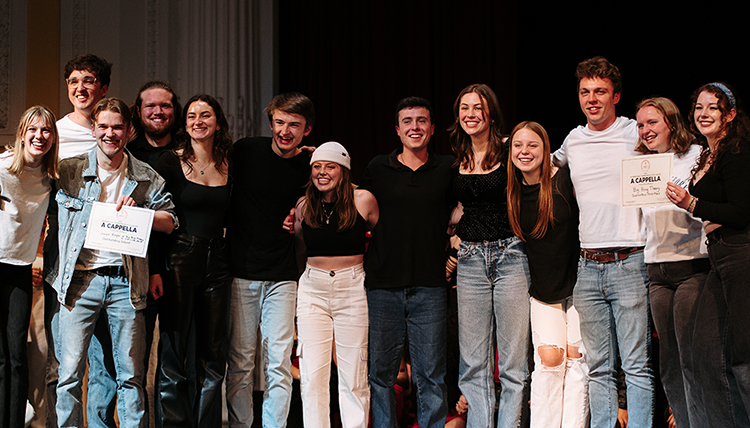 BBT stands on stage after accepting their award BBT stands on stage after accepting their award