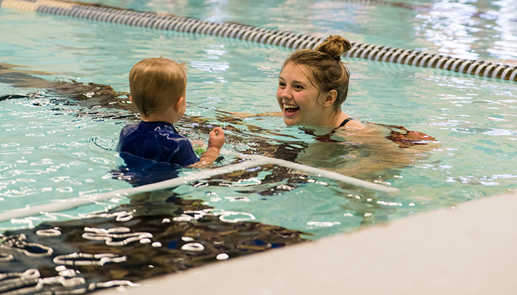 GU student swim instructor teaching swim lessons in the RFC pool GU student swim instructor teaching swim lessons in the RFC pool