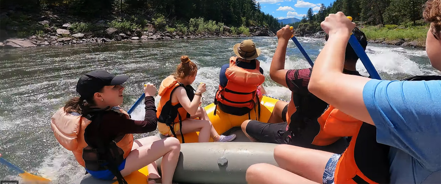 Student group river rafting.