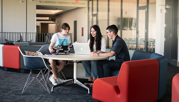 Three students studying in Bollier Three students studying in Bollier