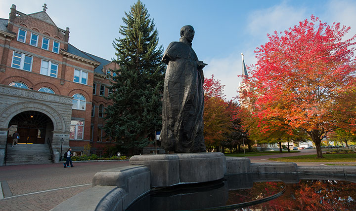St. Ignatius statue in front of College Hall. St. Ignatius statue in front of College Hall.