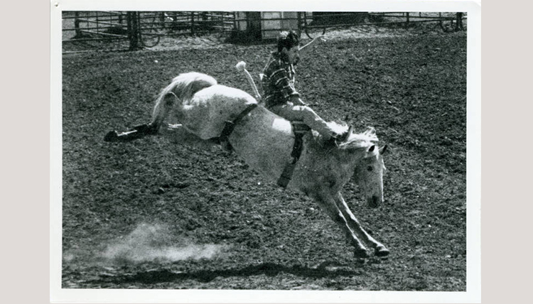 black and white image of a person on a horse black and white image of a person on a horse