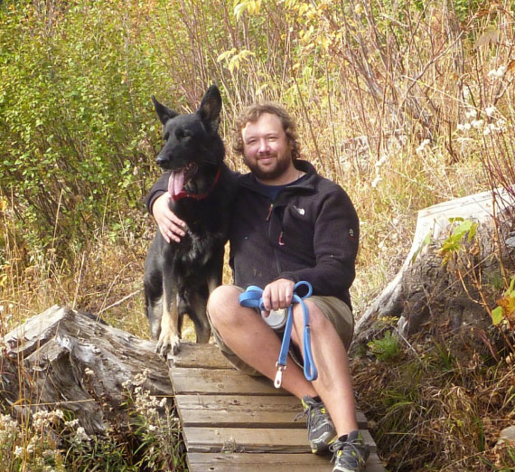 scholarship-jimmy-magnuson-dog Jimmy poses with a dog.