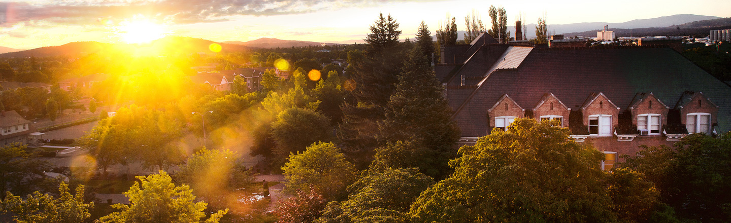 Sunrise over buildings on campus