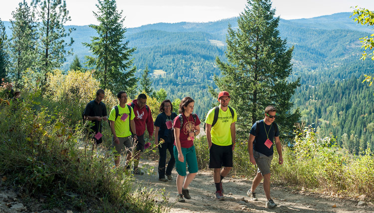 Students walking on trail Students walking on trail
