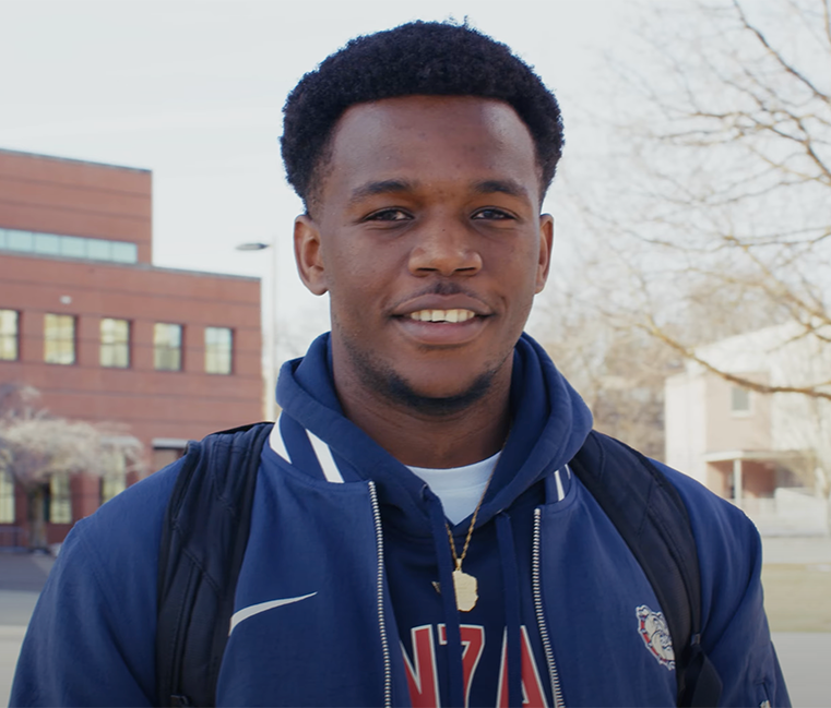 Rest Mugwagwa, a Gonzaga Male student, is smiling