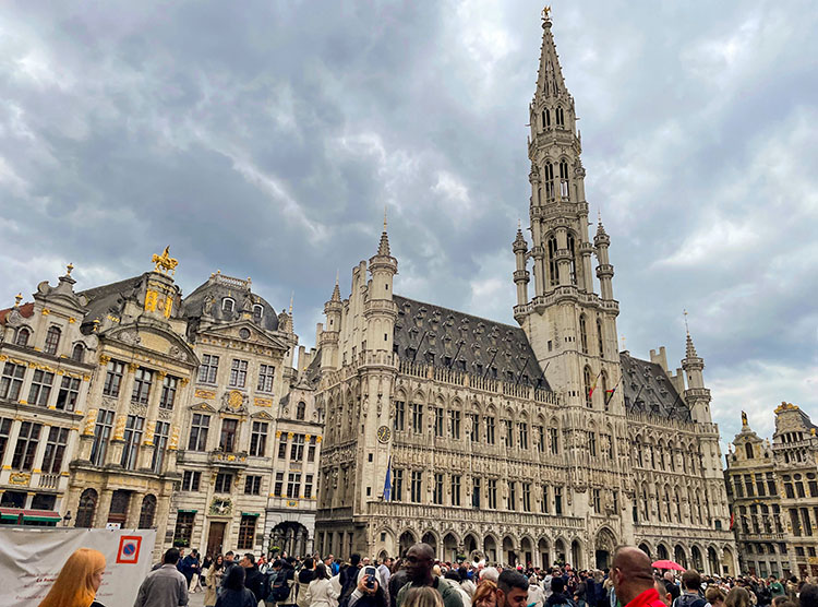 Enormous old building at a large European plaza