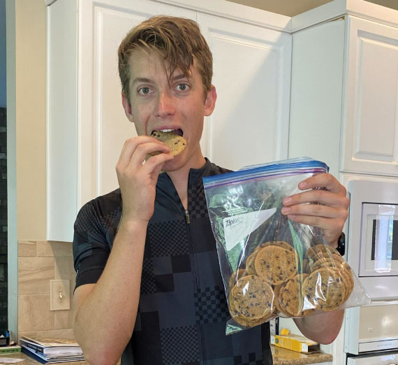 scholarship-jason-orr-eattingcookie Jason Orr, class of 2020, eating a cookie in a kitchen