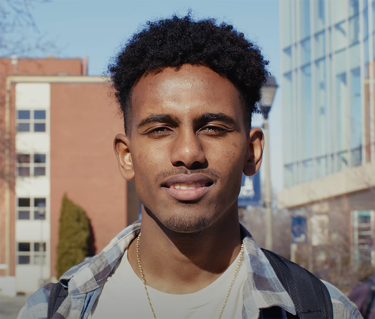 Raja Sori, a Gonzaga University male student is smiling
