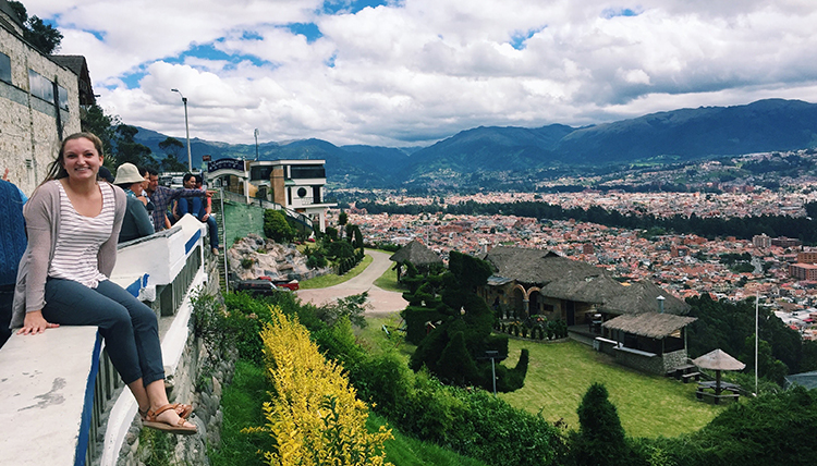 Gonzaga student sits on ledge overlooking city in Ecuador Gonzaga student sits on ledge overlooking city in Ecuador