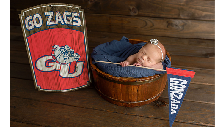 baby in a bucket with a gonzaga flag baby in a bucket with a gonzaga flag