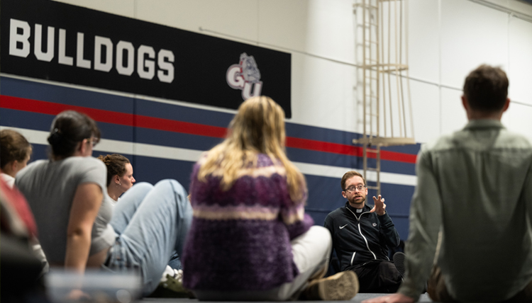 Fr. Tim Breen, S.J., with Gonzaga student athletes