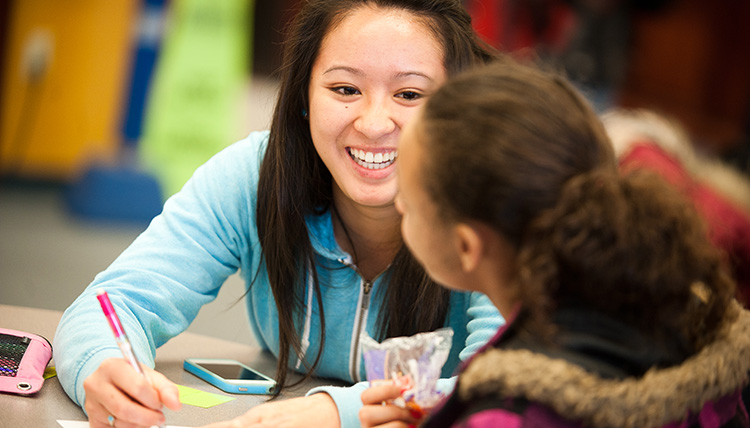 Gonzaga Math Tutoring Outreach Volunteer with Student Gonzaga Math Tutoring Outreach Volunteer with Student