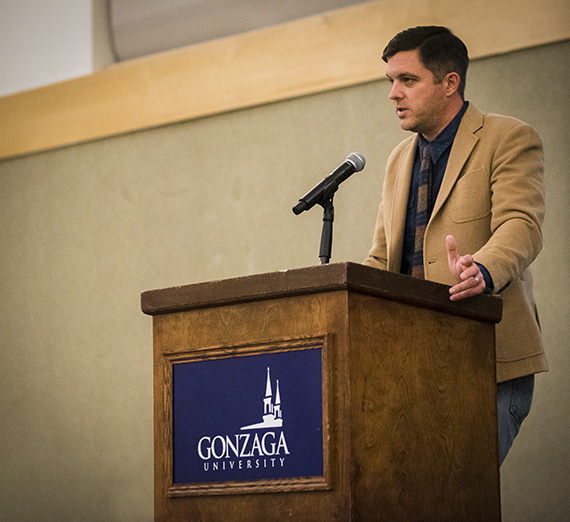 Presenter at a podium.