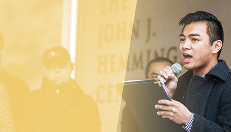 asian american male with microphone and yellow graphic treatment asian american male with microphone and yellow graphic treatment