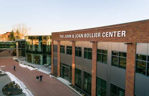 Overhead shot of the Bollier Center for Integrated Science and Engineering. The building is a large brick building with large glass windows across the two stories. In the background is the sky bridge and glass rotunda connecting the Bollier Center to the Herak Building. Overhead shot of the Bollier Center for Integrated Science and Engineering. The building is a large brick building with large glass windows across the two stories. In the background is the sky bridge and glass rotunda connecting the Bollier Center to the Herak Building.