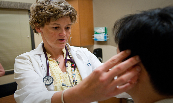 nurse working on patient nurse working on patient