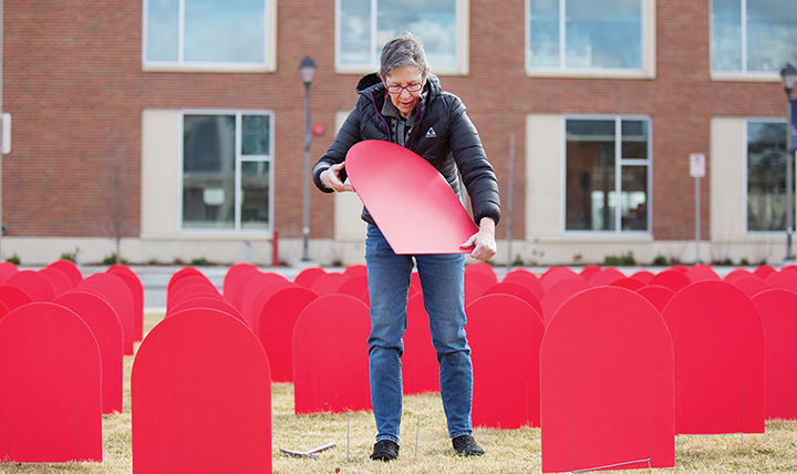 Gonzaga woman with tombstones for suicide awareness Gonzaga woman with tombstones for suicide awareness