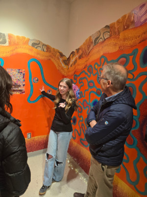 Ava Knap, Art and Neuroscience student discussing her exhibit Ava Knap, Art and Neuroscience student discussing her exhibit