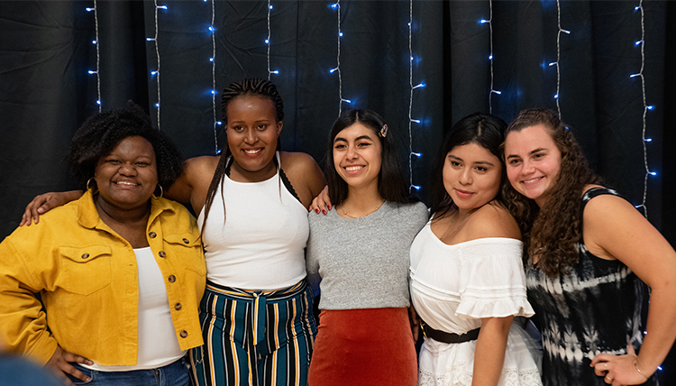 five women students from different nations