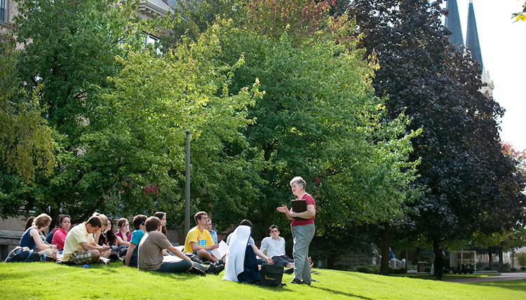 Summer Session class held outside of College Hall Summer Session class held outside of College Hall