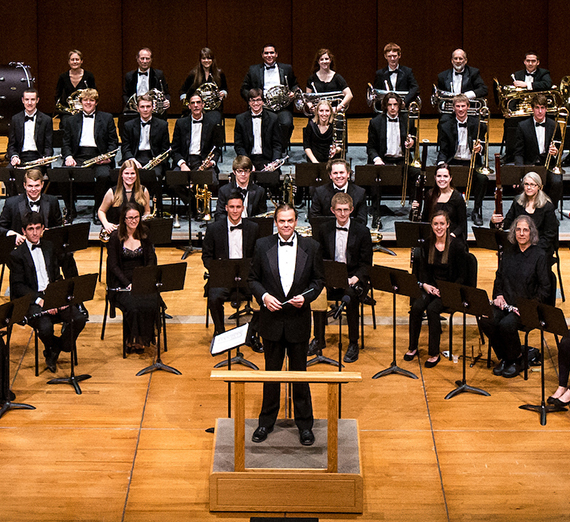 Members of GU's Wind Symphony pose before a performance at the Fox Theater