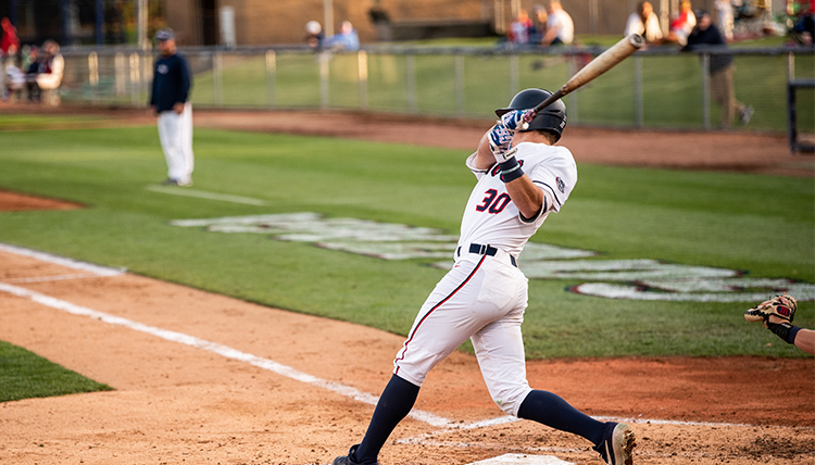 A Gonzaga baseball player goes to bat at a home game. A Gonzaga baseball player goes to bat at a home game.
