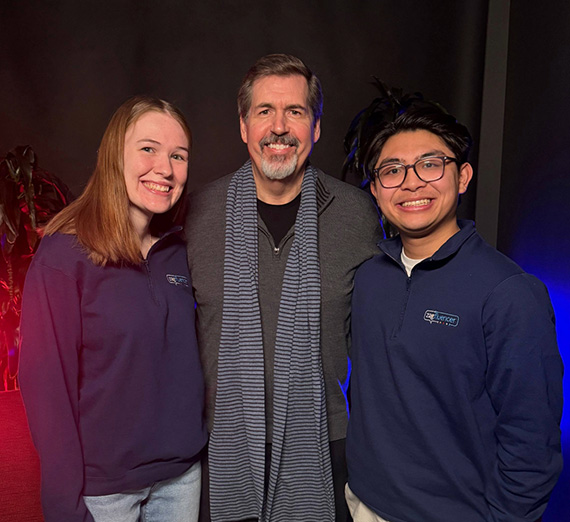 Two Zagluencer students stand on either side of Gonzaga University President Thayne McCulloh. Two Zagluencer students stand on either side of Gonzaga University President Thayne McCulloh.