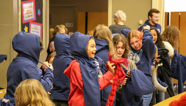 Children from Bemiss and Stevens Elementary Schools receiving their hoodies from Gonzaga. Children from Bemiss and Stevens Elementary Schools receiving their hoodies from Gonzaga.