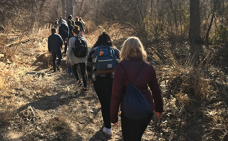 Students walk through the wilderness near the U.S./Mexico border Students walk through the wilderness near the U.S./Mexico border