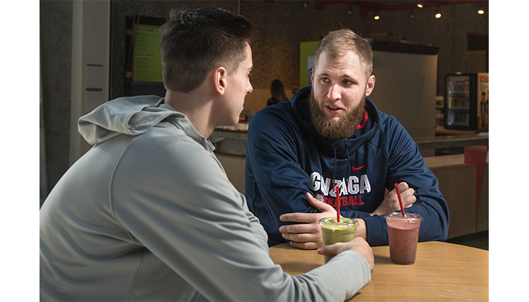 Gonzaga basketball giants Przemek Karnowski and Zack Collins drink protein shakes. Gonzaga basketball giants Przemek Karnowski and Zack Collins drink protein shakes.