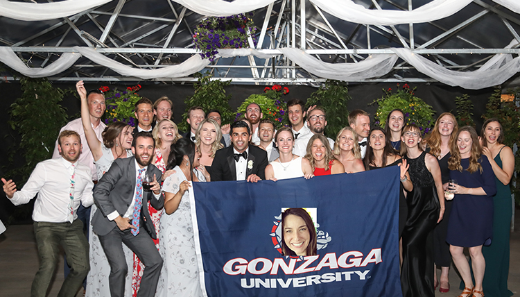 large group at wedding with Gonzaga flag large group at wedding with Gonzaga flag